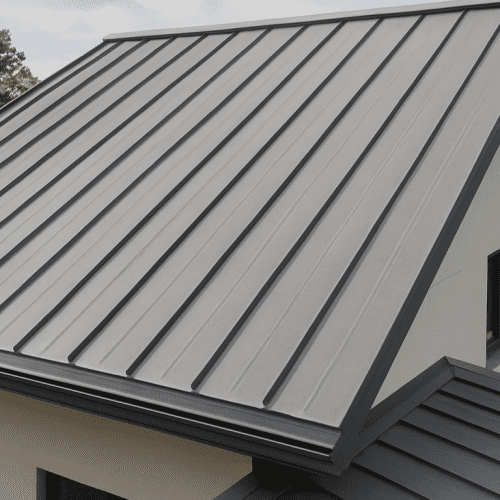 Standing seam metal roofing installed on a modern residential home, showing durable metal panels and sleek design.